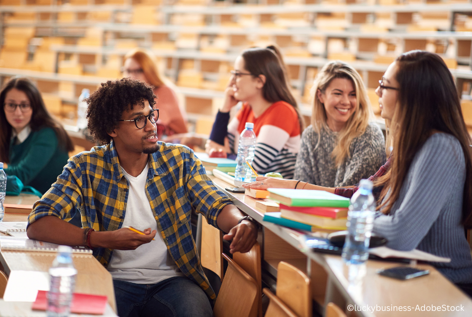 Young freshmen students talking and smiling